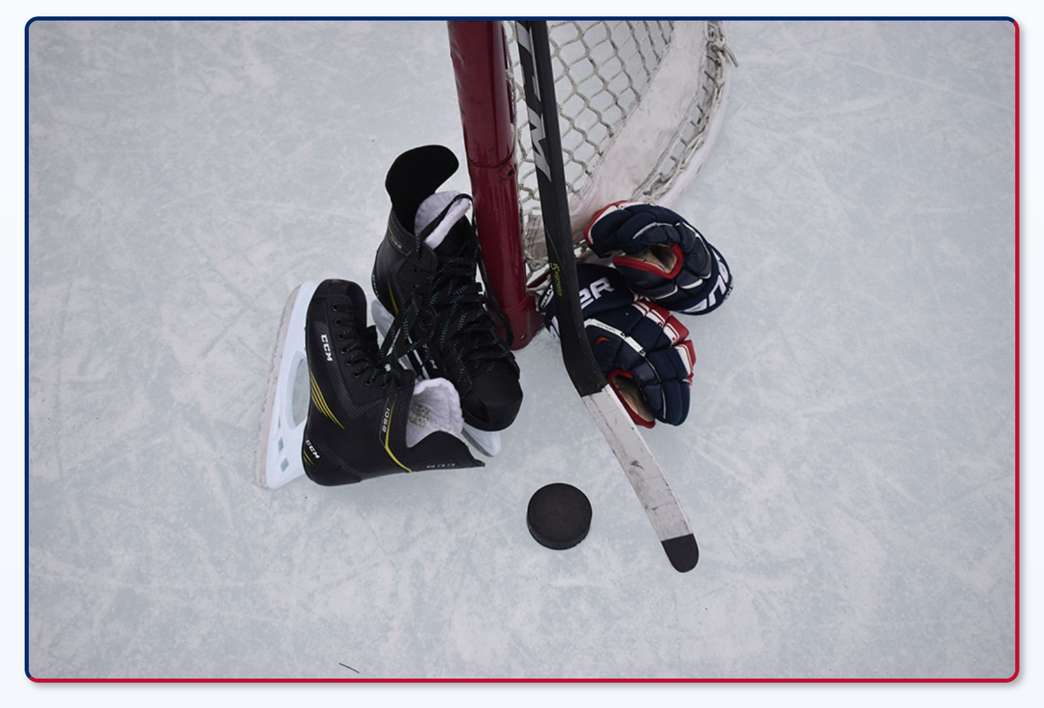 Ice Hockey Skates And Gloves